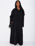 ABAYA AMPLE EN SATIN FLUIDE A EMPIECEMENTS EN DENTELLE A STRASS